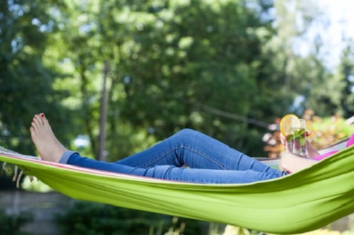 http://www.dreamstime.com/stock-photos-woman-resting-drink-hammock-image42325933